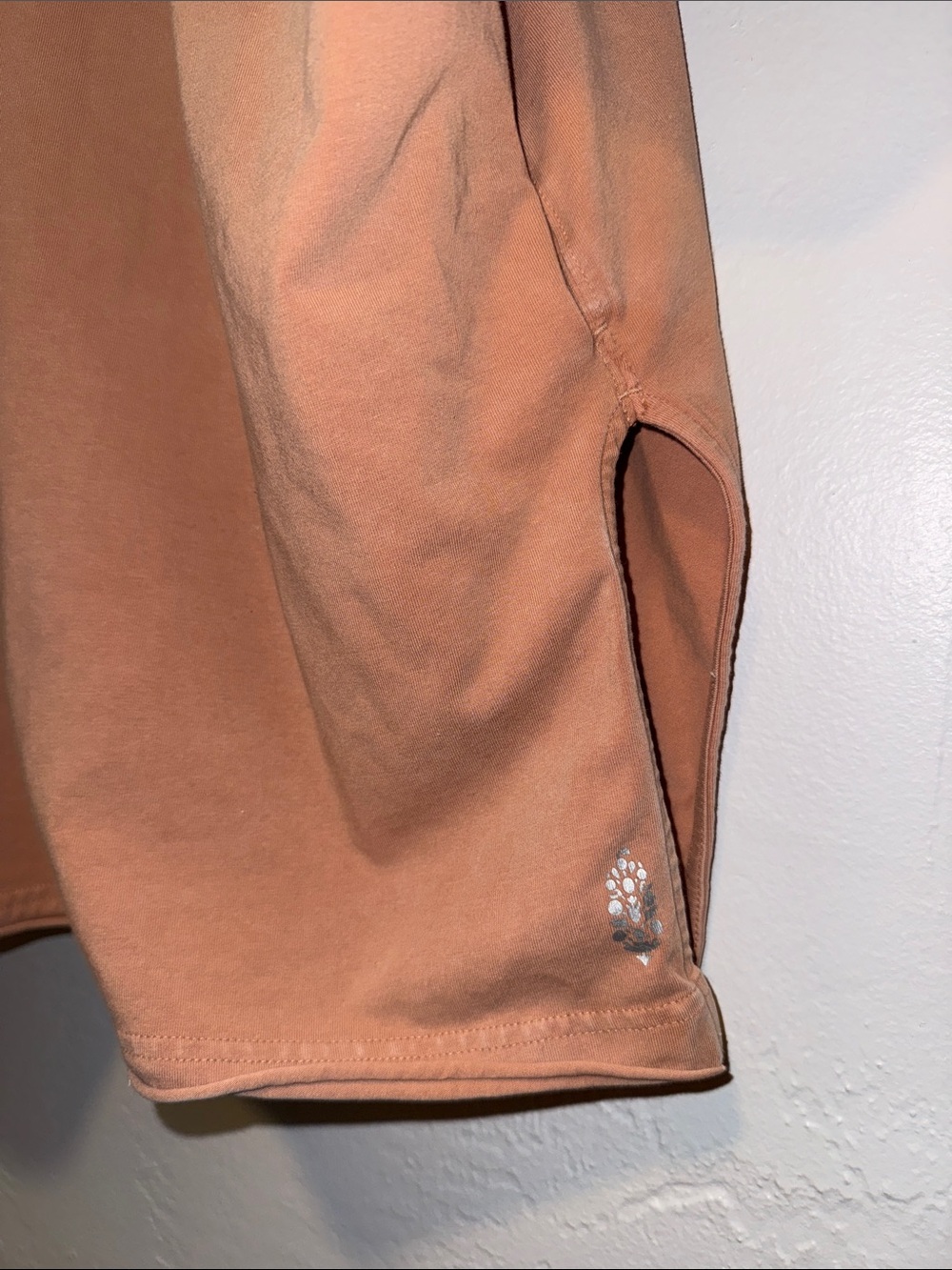 FP Movement by Free People Oversized V-Neck Short Sleeve Top in Dusty Peach - Picture 3 of 6